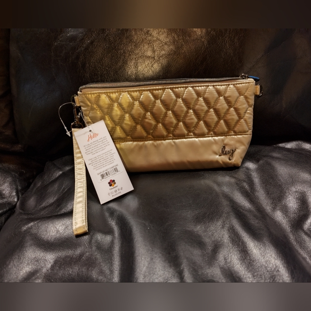 Lug Shiplap RFID Wristlet Clutch in Metallic Champagne